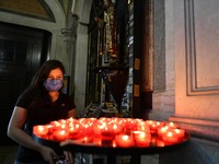A woman wearing protective mask visit a church in the Chiado district of Lisbon, Portugal on September 27, 2021. Portugal recorded one death...