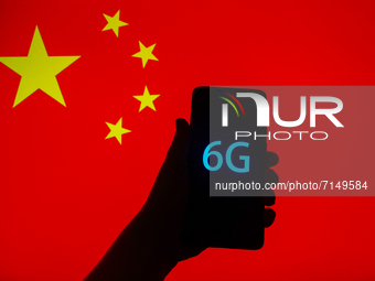 6G sign is seen on the smartphone screen with China national flag in the background in this  illustration photo taken in Krakow, Poland on S...