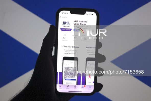 Scotland’s Vaccine Passport App is seen on a smartphone screen with the Scottish Saltire flag in the background in this illustration photo t...