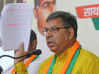 Rajasthan BJP President Satish Poonia addresses a press conference over the REET exam rigging, in Jaipur, Rajasthan , India,Thursday, Sept 3...