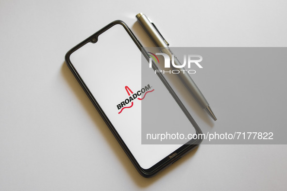 In this photo illustration a Broadcom logo is display on a smartphone screen and a pencil in Athens, Greece on October 4, 2021. 