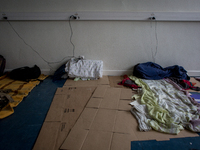 The Jean Quarré school in Paris on 2015/08/04. Differents beds of migrants. Some are sleeping in the dormitory when the others choose the fi...