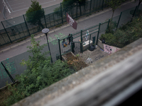 Occupation of the Jean Quarré school by migrants in Paris on 2015/08/04.
In photo: Entrance of the school seing from the building. Since fr...