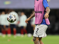Giovanni Di Lorenzo of Italy warms up during the UEFA Nations League Finals 2021 semi-final football match between Italy and Spain at Giusep...