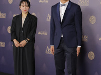 Director Yoon Danbi and Royston Tan attends the 15th Asian Film Awards during the 26th Busan International Film Festival at Paradise Hotel o...