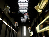 Helium-filled, rotor-propelled 'aerobes' forming artist Anicka Yi's 'In Love With The World' float around the Turbine Hall of the Tate Moder...