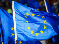 EU flags are seen during 'We're staying in EU' demonstration at the Main Square in Krakow, Poland on October 10, 2021. The pro-EU demonstrat...