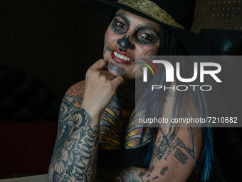 Colombian tattoo artist Lina Matilde Sánchez, poses for photos in her tattoo studio 'Tattoo studio Catrina'. For more than 16 years she has...
