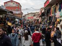 People shop in the bazaar, in Istanbul, Turkey, on October 13, 2021 (