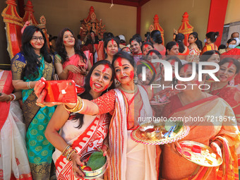 Jaipur: Married women  take selfie  during 'Sindoor Khela' before the immersion of Goddess Durga on the last day of Durga Puja festival in J...