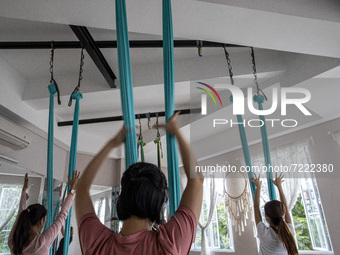 Aerial Yoga is active again after the COVID-19 pandemic decreased in the Tangerang area, Banten, Indonesia. An Aerial Yoga place called Aeri...