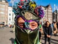 A Chilean woman is wearing a typical Chilean mask covering all her face, during the demonstration on the second anniversary of the Chilean s...