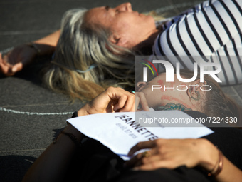 A woman during the die-in. She painted her face as she was slapped. Women from the collective NousToutes organized a die-in in Toulouse to p...