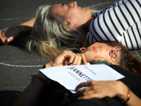 A woman during the die-in. She painted her face as she was slapped. Women from the collective NousToutes organized a die-in in Toulouse to p...