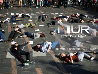 Women from the collective NousToutes organized a die-in in Toulouse to pay tribute to women victim of murder by their male partner and to as...
