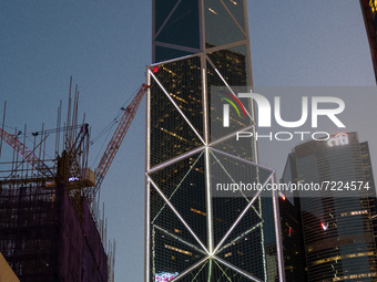  The Bank of China tower rises as construction sites build new towers in Central Hong Kong. (