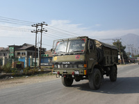 Indian paramilitary troopers leave  alert during a gun battle between Indian Forces and militants in Pampore area of Pulwama district south...