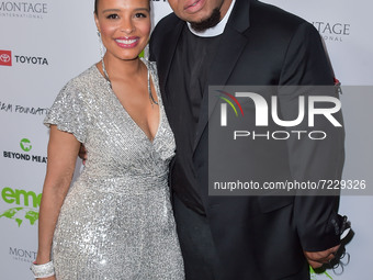 Antonique Smith and Rev Yearwood arrive at the Environmental Media Association (EMA) Awards Gala 2021 held at GEARBOX LA on October 16, 2021...