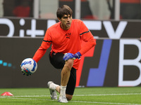 Ciprian Tatarusanu of AC Milan warms up during the Serie A 2021/22 football match between AC Milan and Hellas Verona FC at Giuseppe Meazza S...