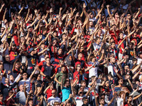 Genoa CFC fans sing and clap their hands to support the team during the Italian football Serie A match Genoa CFC vs US Sassuolo on October 1...