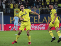 Villarreal's Gerard Moreno  celebrate after scoring the 1-1 goal with his teammate   during  La Liga  match between Villarreal CF and C.A. O...