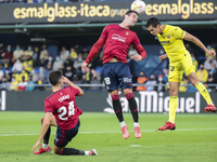 Like Garcia  of C.A. Osasuna (C) and Villarreal's Aissa Mandi   during  La Liga  match between Villarreal CF and C.A. Osasuna   at La Cerami...