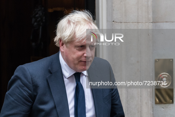 LONDON, UNITED KINGDOM - OCTOBER 18, 2021: British Prime Minister Boris Johnson leaves 10 Downing Street for the House of Commons to lead tr...