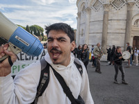 Opponents of Italy's Green pass gathered in Miracle Square during the visit of President Sergio Mattarella in Pisa, Italy, on October 18, 20...