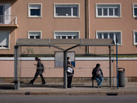 People are waiting on a bus station near Matosinhos beach on October 18, 2021, a city and a municipality in the northern Porto district of P...