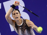 Andrea Petkovic of Germany returns the ball to Jelena Ostapenko of Latvia during the women's singles Round of 32 tennis match of the WTA 500...