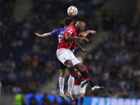 Rafael Leao forward of AC Milan (R) vies with Porto’s Brazilian midfielder Otavio (L) in action during the UEFA Champions League Group stage...