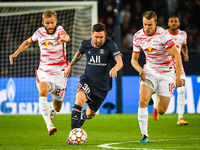 Konrad LAIMER of RB Leipzig, Lionel (Leo) MESSI of PSG and Lukas KLOSTERMANN of RB Leipzig during the UEFA Champions League, Group A footbal...