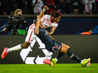 Mohamed SIMAKAN of RB Leipzig and Kylian MBAPPE of PSG during the UEFA Champions League, Group A football match between Paris Saint-Germain...