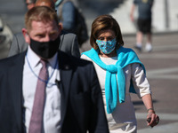 Speaker of the House Nancy Pelosi walks from the Capitol to a press conference about healthcare and President Biden's Build Back Better plan...