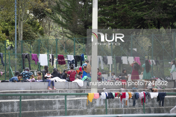 Indigenous people hang their clothes from her after washing them in the national park on October 20, 2021 in Bogota, Colombia. Approximately...