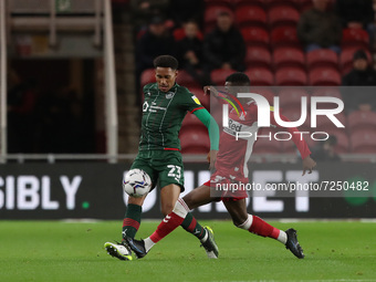Barnsley's William Hondermarck in action with Middlesbrough's Isaiah Jones during the Sky Bet Championship match between Middlesbrough and B...