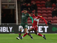 Barnsley's William Hondermarck in action with Middlesbrough's Isaiah Jones during the Sky Bet Championship match between Middlesbrough and B...