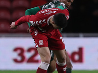 Middlesbrough's Martin Payero battles for possession with William Hondermarck of Barnsley  during the Sky Bet Championship match between Mid...