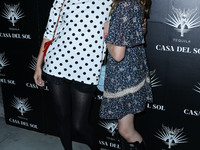 Actress Milla Jovovich and daughter/actress Ever Gabo arrive at Brian Bowen Smith's Drivebys Book Launch And Gallery Viewing Presented By Ca...