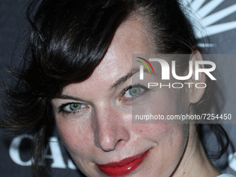 Actress Milla Jovovich arrives at Brian Bowen Smith's Drivebys Book Launch And Gallery Viewing Presented By Casa Del Sol Tequila held at 817...