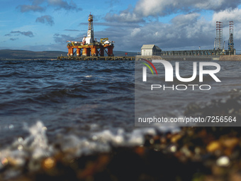 A general view of disused Oil rigs anchored in the Cromarty Firth on October 22, 2021 in Cromarty, Scotland. 70 leading climate scientists f...