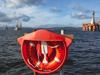 A general view of disused Oil rigs anchored in the Cromarty Firth on October 22, 2021 in Cromarty, Scotland. 70 leading climate scientists f...