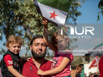 A demonstration in the Syrian city of Azaz at the Bab al-Salama crossing to support the national and Turkish armies and call them to liberat...