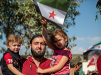 A demonstration in the Syrian city of Azaz at the Bab al-Salama crossing to support the national and Turkish armies and call them to liberat...