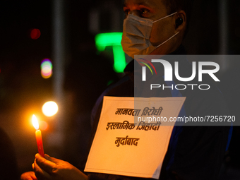 Nepalese people take part in candlelight vigil protest on recent atrocities against minority Hindu in Bangladesh at Kathmandu, Nepal on Frid...