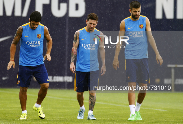 BARCELONA -august 13- SPAIN: Luis Suarez, Leo Messi and Gerard Pique in the training of FC Barcelona, held on the Ciutat Esportiva Joan Gamp...