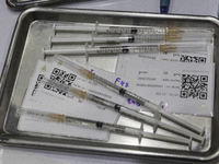 A syringe containing AstraZeneca vaccine to people who come to receive the third AstraZeneca Dose (Booster) vaccine at the auditorium of The...
