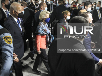 President Joe Biden and European Commission President Ursula von der Leyen walk together on day three of the COP 26 United Nations Climate C...