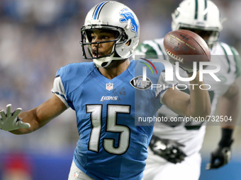 Detroit Lions WR Golden Tate (15) runs the ball on a during the first half of the 2015 NFL preseason football game against the New York Jets...