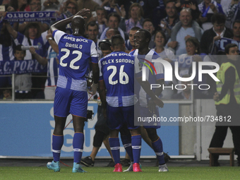 Porto's Cameroonian forward Vincent Aboubakar celebrates after scoring with teammates during the Premier League 2015/16 match between FC Por...
